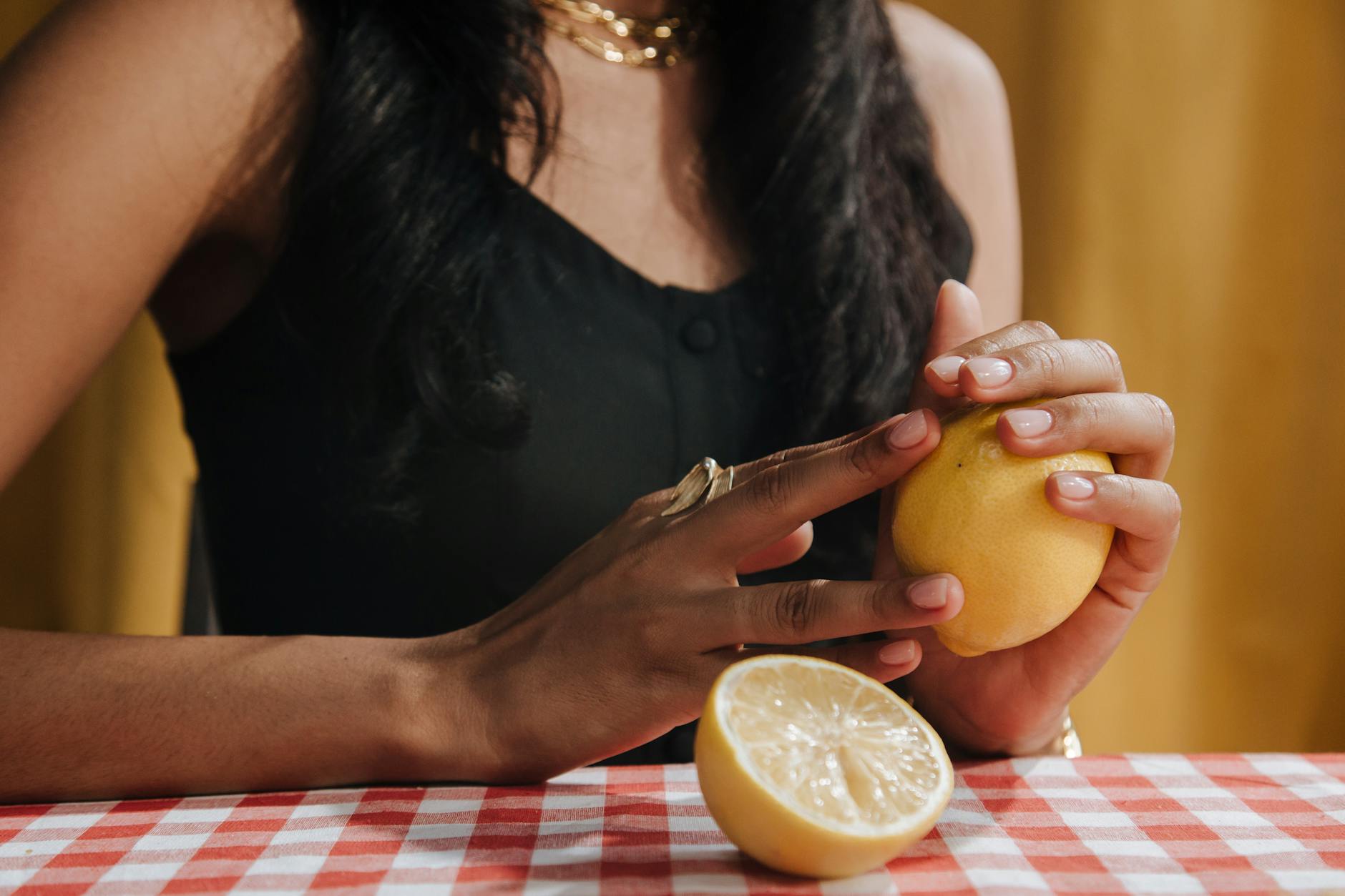 Collection of vibrant lemon-colored and colorful sex toys displayed on a bright yellow background
