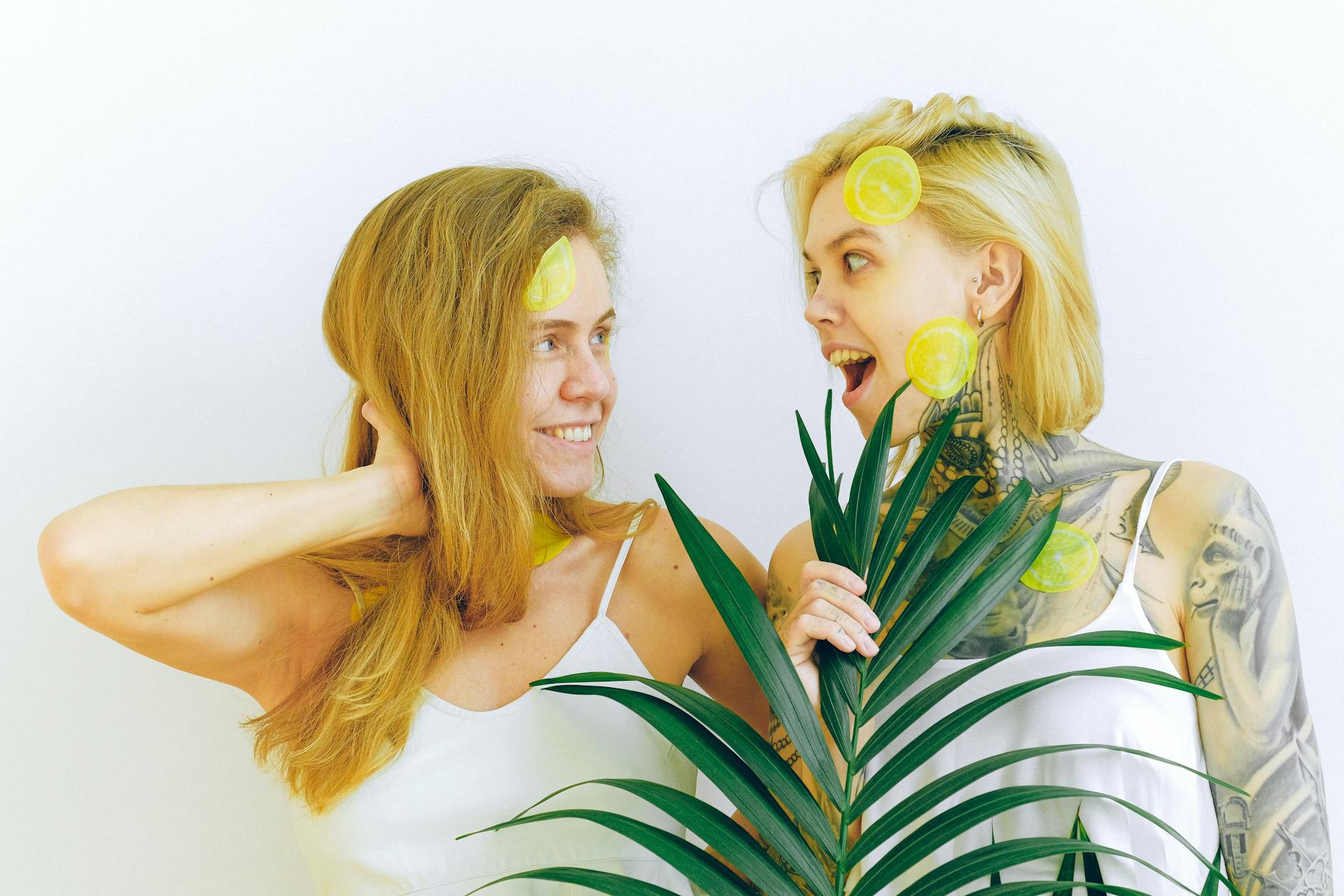 Two women smiling and laughing together, representing emotional intimacy and joy in long-term partnerships